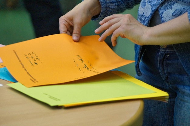A close-up shot of an IEP document, with highlights and notes, symbolizing the careful review and collaboration involved in creating an effective educational plan for a student with disabilities.