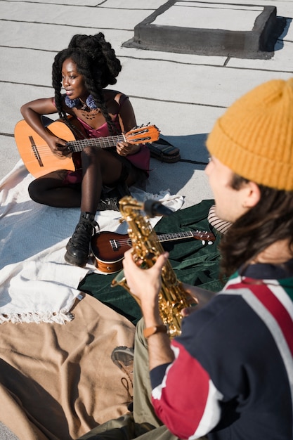 A collage of diverse students participating in various extracurricular activities, such as playing musical instruments, engaging in scientific experiments, and participating in sports. All images highlight teamwork and involvement.