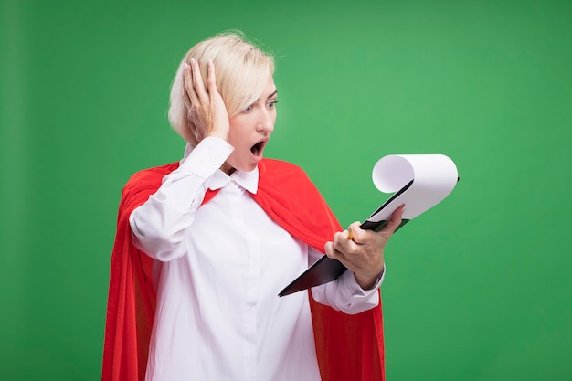 A person gleefully crossing off a small debt from a list with a giant red marker, symbolizing the quick wins and motivational aspect of the debt snowball method. The background shows a gradually increasing snowball.