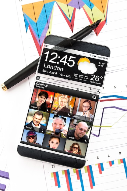 A collage of different fintech apps on a tablet, showcasing their user-friendly interfaces and features related to automated savings and investments. The tablet is resting on a desk with a notebook and pen.