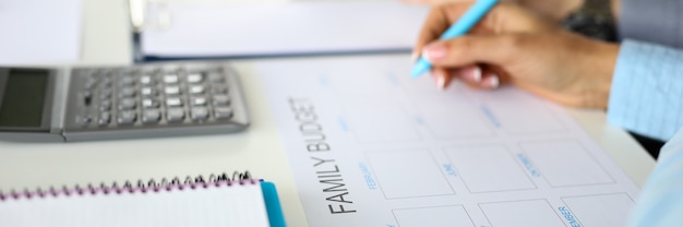 A close-up shot of a family calendar with daycare expenses clearly marked, emphasizing the planning and budgeting aspects of using a Dependent Care FSA.