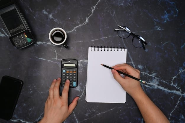 A close-up shot of a hand holding a property tax bill, with a calculator and pen in the background.