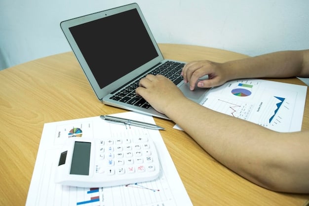 A person using a calculator and looking at stock market data on a laptop screen, highlighting the calculation of ESPP gains.