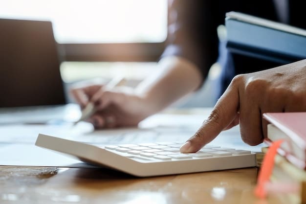 A close-up shot of hands using a calculator and reviewing financial documents, emphasizing the analytical aspect of 401(k) planning.