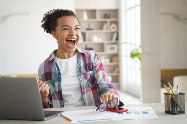 An image depicting a young professional joyfully paying off student loans on a laptop, with a separate window showing their growing retirement account balance. The scene is vibrant and conveys a sense of financial empowerment.